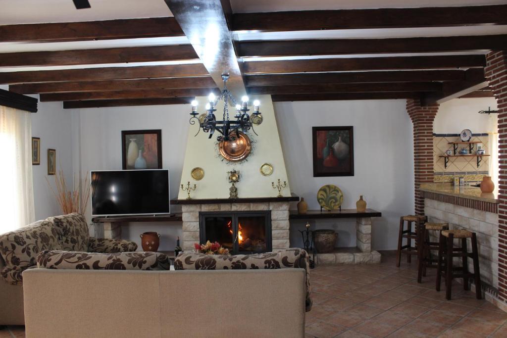 Posezení v ubytování Villa Hierbabuena