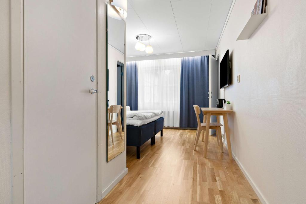 TV a/nebo společenská místnost v ubytování Best Western Hotell Lerdalshoejden