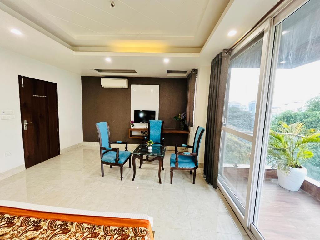 Posezení v ubytování Hotel Dayal Regency, Shushant Lok sector 29, Near Fortis Hospital