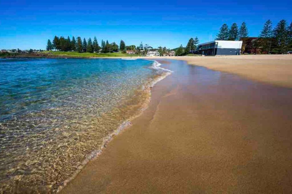 a view of the beach from the shore at Driftwood Beach House in Kiama