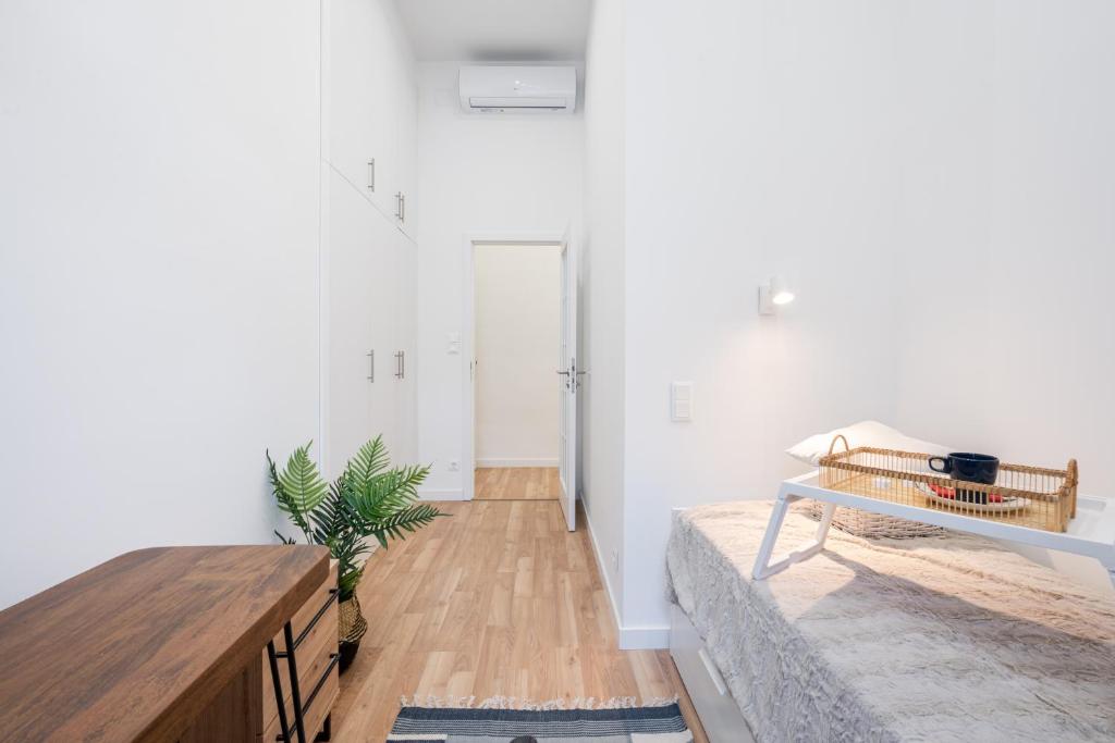 A bed or beds in a room at Budapest Eye Residence