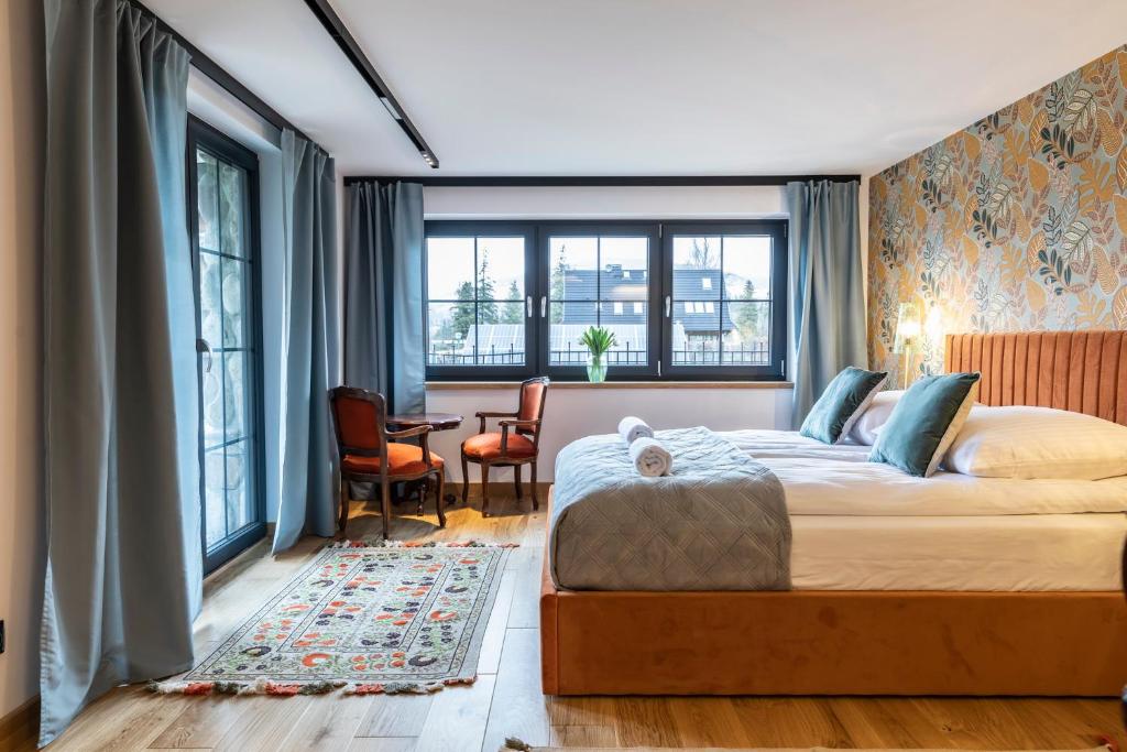 Posteľ alebo postele v izbe v ubytovaní udanypobyt Dom VALLEY VILLA