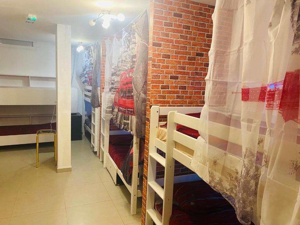 Postel nebo postele na pokoji v ubytování Hostel OT