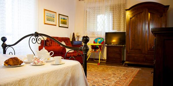 Postel nebo postele na pokoji v ubytování Agriturismo Le Case Di Civi