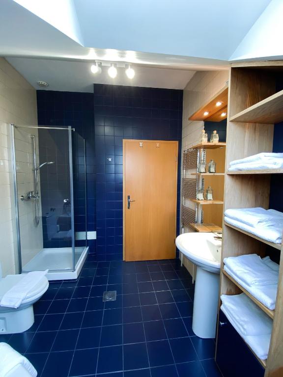 Koupelna v ubytování Fado Apartments Lendava