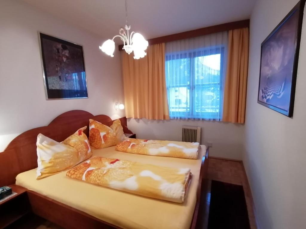 Postel nebo postele na pokoji v ubytování Appartement Sonja Nassfeld