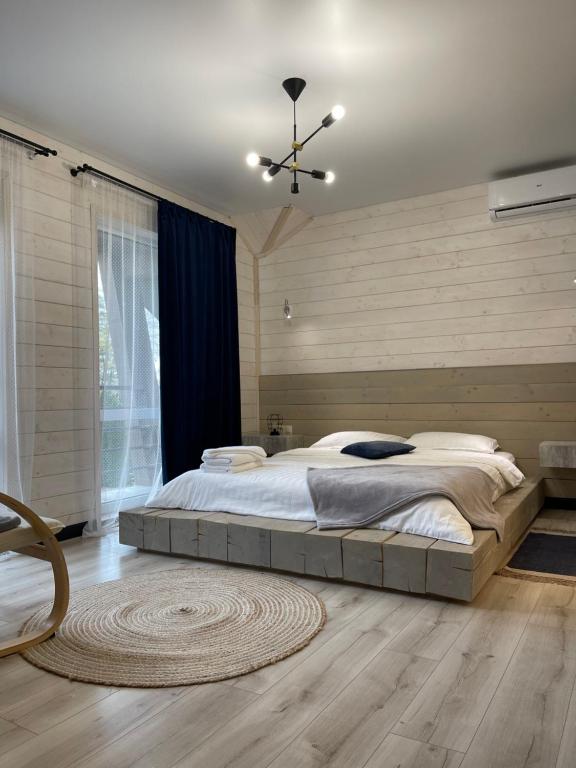 Postel nebo postele na pokoji v ubytování Sandal