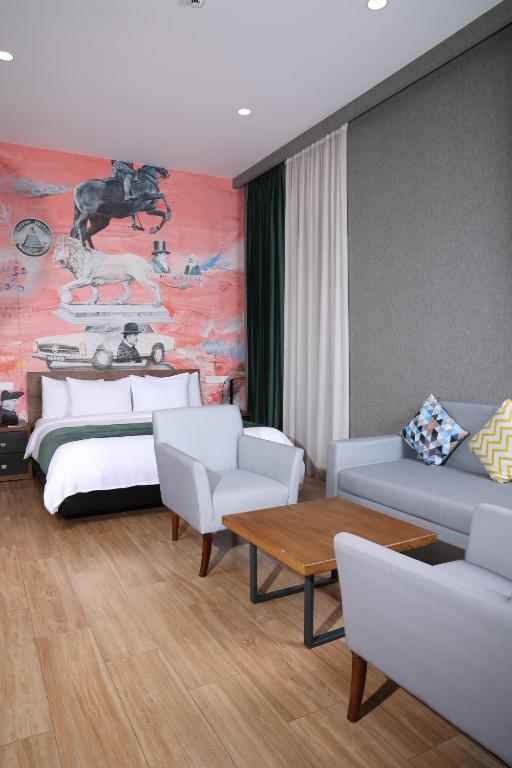 Postel nebo postele na pokoji v ubytování Theory Hotel