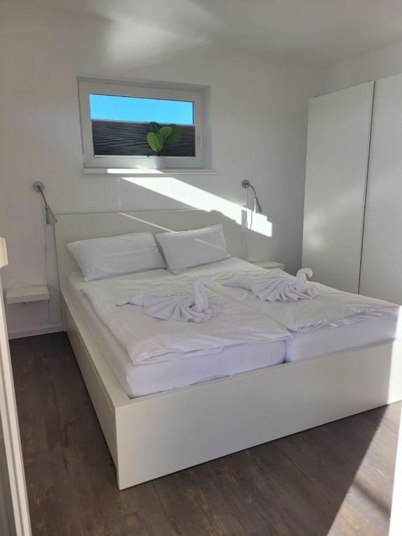 Postel nebo postele na pokoji v ubytování 4 Sterne Dtv Floating House