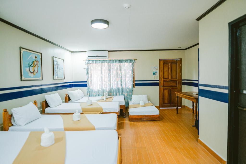 Postel nebo postele na pokoji v ubytování Jazmine's Place