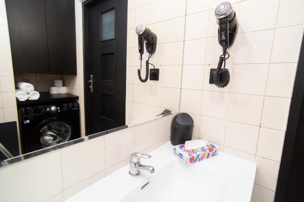 Kúpeľňa v ubytovaní Warsaw Apartments - Apartamenty Sadyba