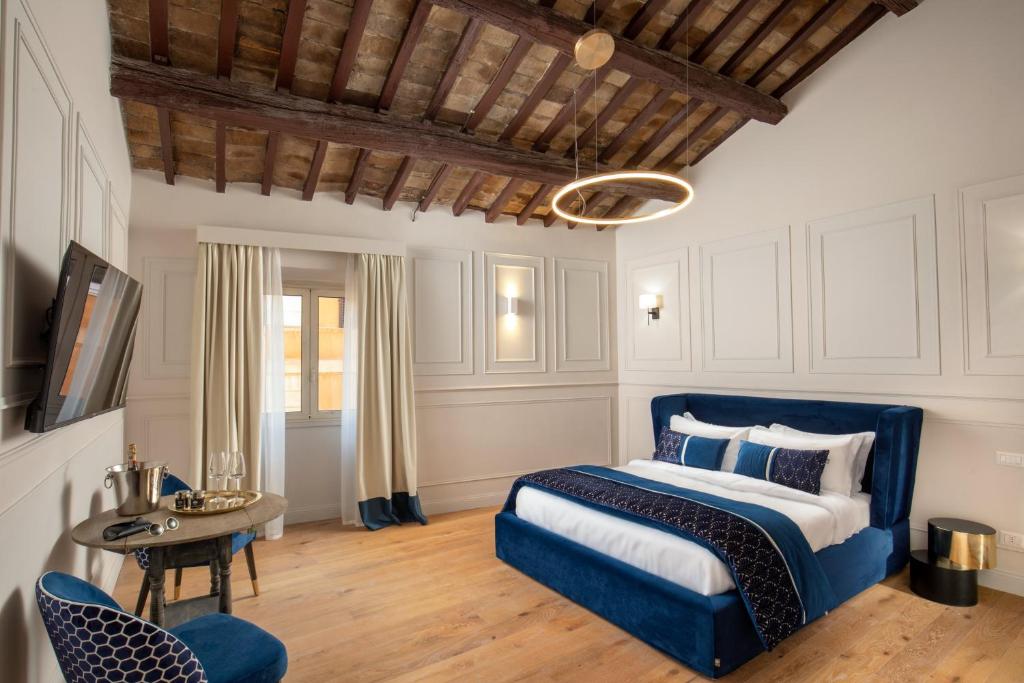 A bed or beds in a room at Garden Palace