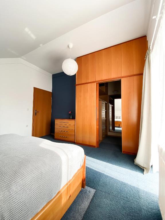 Postel nebo postele na pokoji v ubytování Fado Apartments Lendava