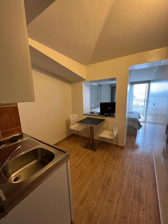 Kuchyň nebo kuchyňský kout v ubytování Apartments Villa Simoni