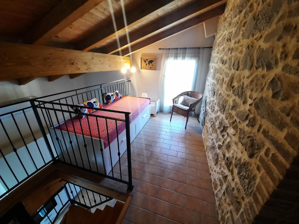 Posteľ alebo postele v izbe v ubytovaní PIGGIOLO
