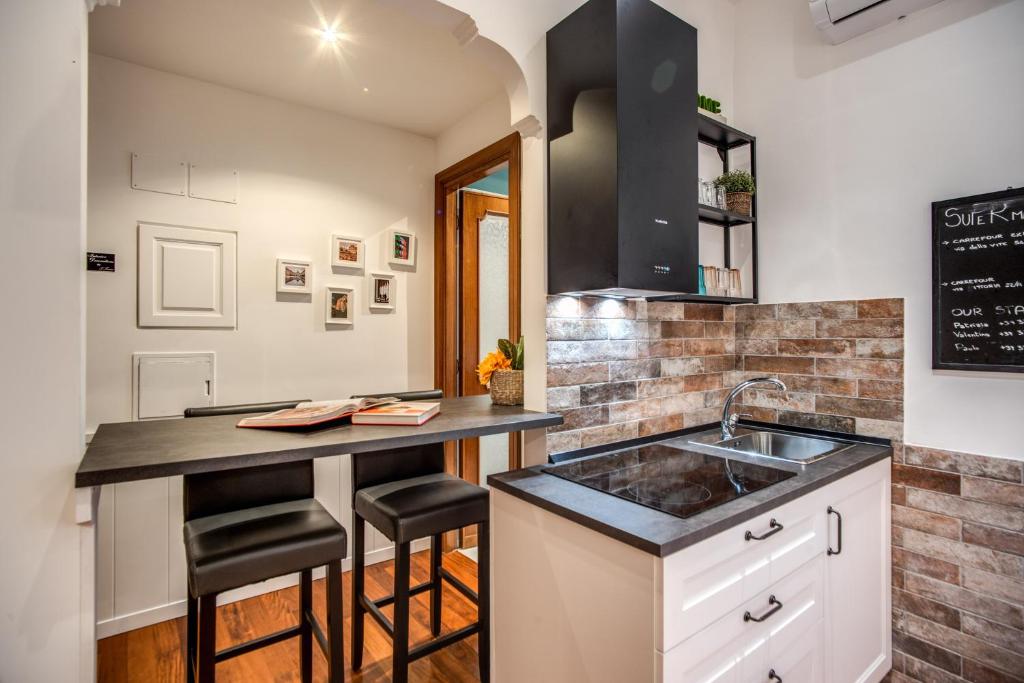 Kuhinja oz. manjša kuhinja v nastanitvi Spanish Steps Miracle Suite