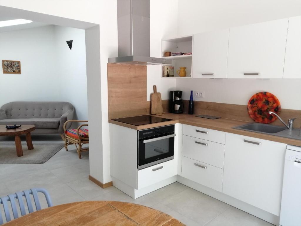 Kuchyň nebo kuchyňský kout v ubytování Chambre d'hotes CHEVREFEUILLE