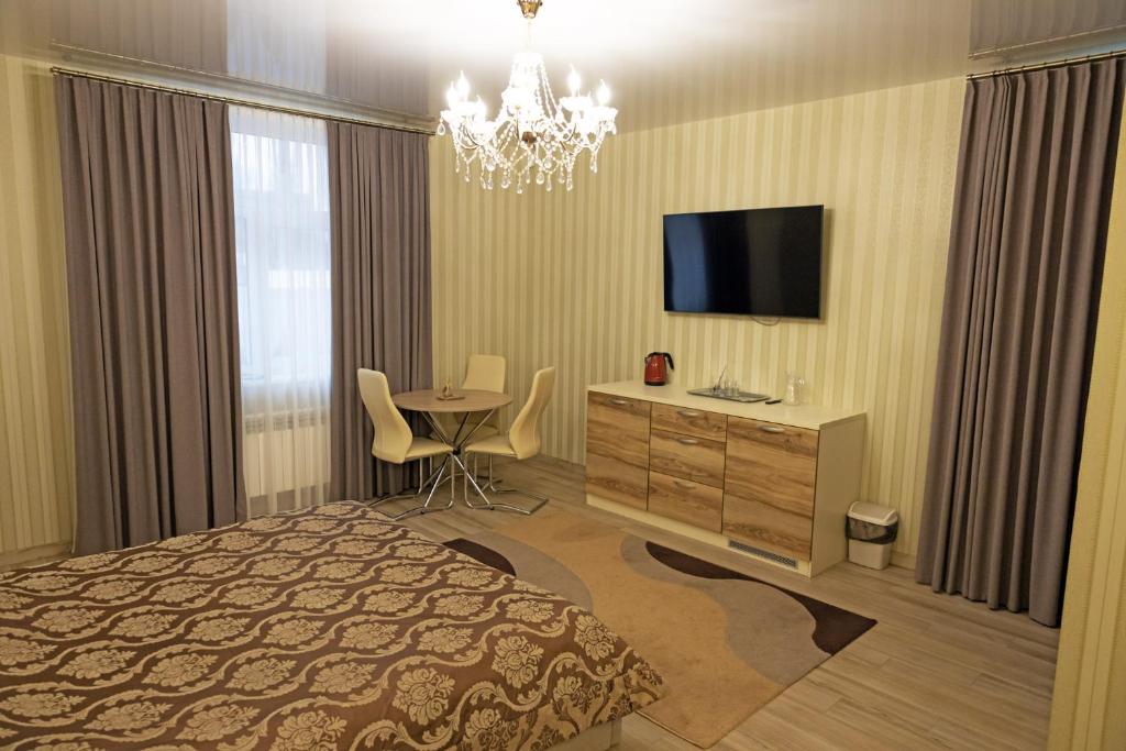 TV a/nebo společenská místnost v ubytování Готель Otelnov