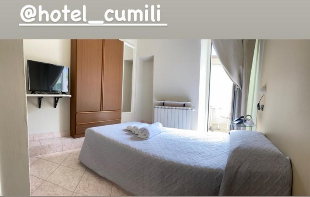 Postel nebo postele na pokoji v ubytování Hotel Cumilì