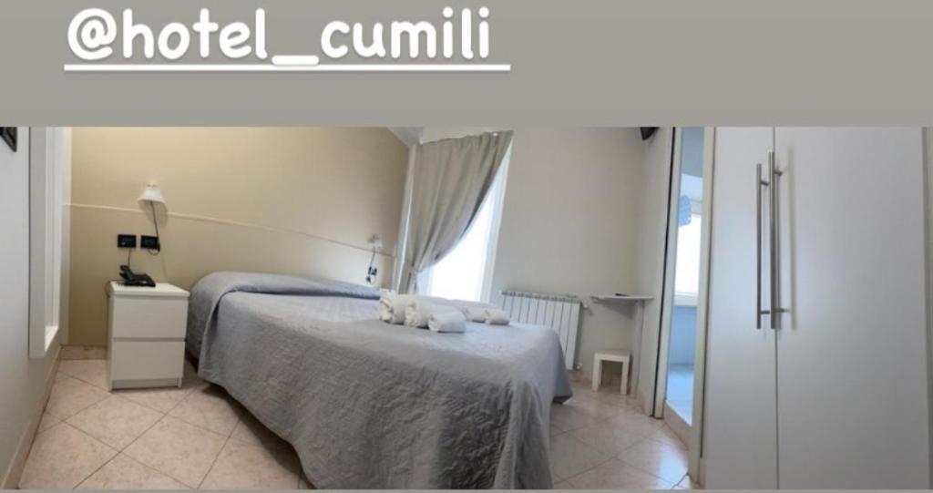 Postel nebo postele na pokoji v ubytování Hotel Cumilì