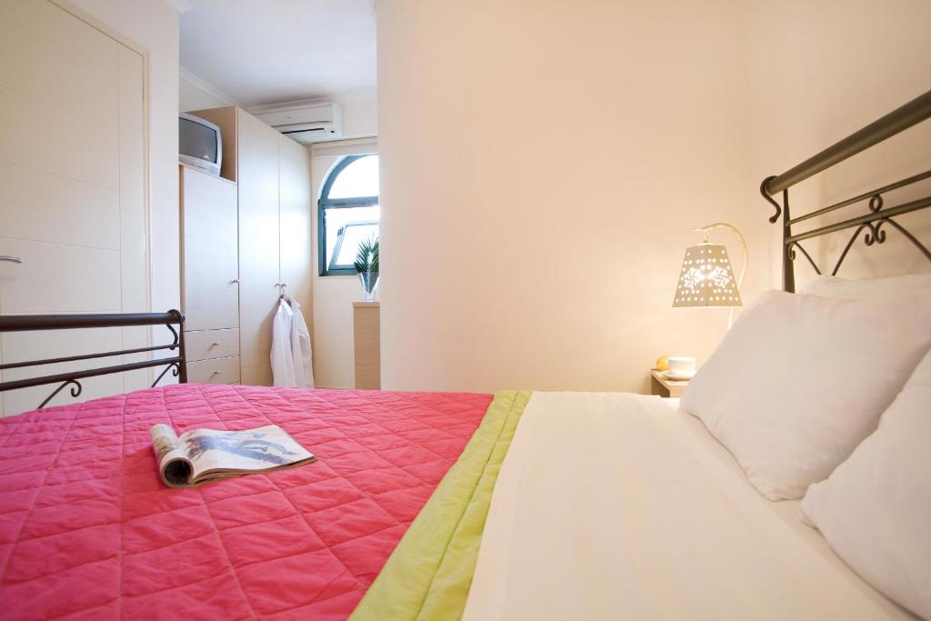 Postel nebo postele na pokoji v ubytování Anemolia Apartments