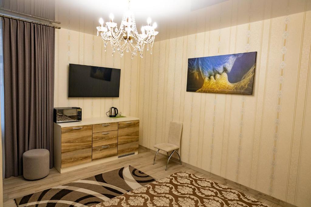 TV a/nebo společenská místnost v ubytování Готель Otelnov
