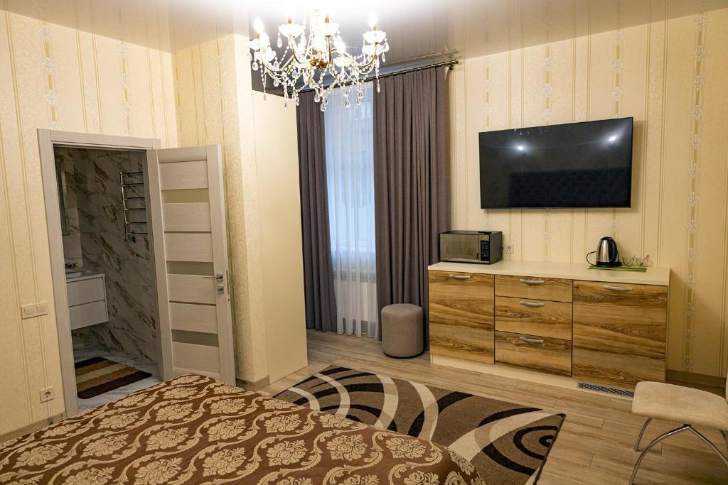 TV a/nebo společenská místnost v ubytování Готель Otelnov
