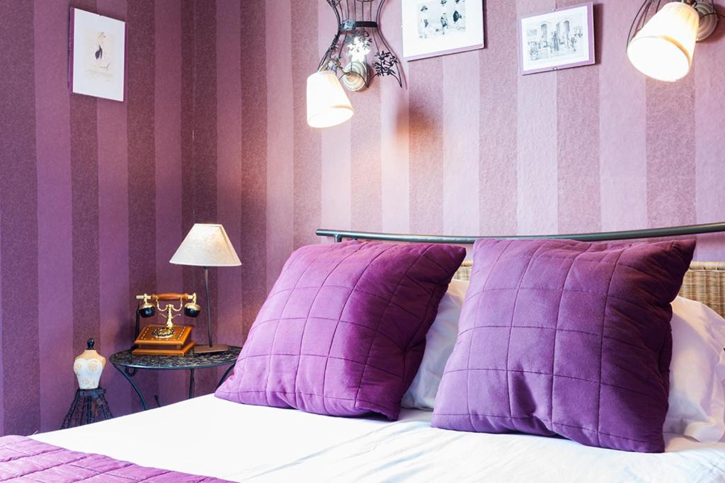 Postel nebo postele na pokoji v ubytování Logis le Relais Sarrasin
