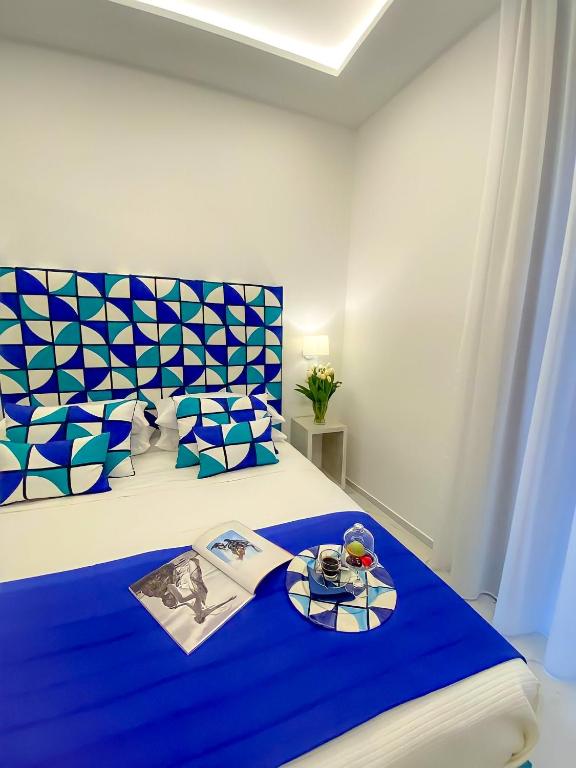 Postel nebo postele na pokoji v ubytování Sorrento Lux Suite