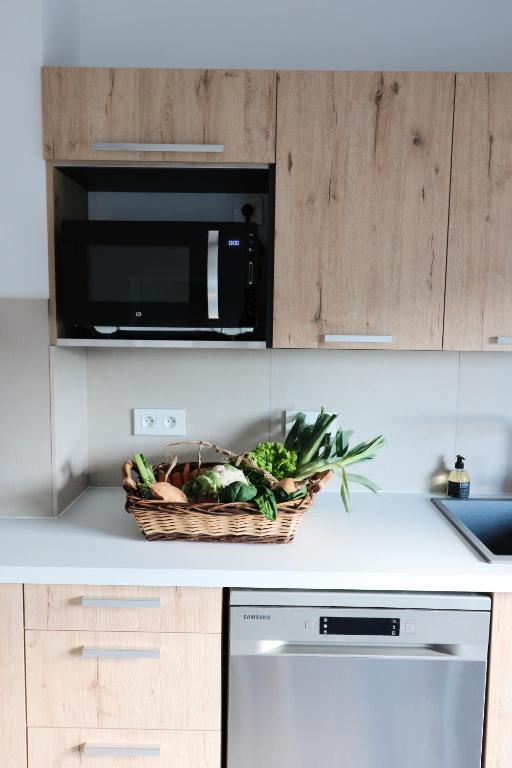 Kuchyňa alebo kuchynka v ubytovaní Appartements à la ferme