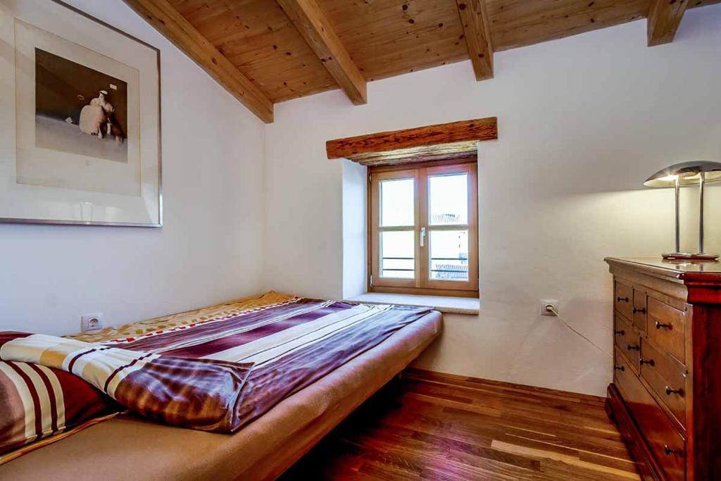 Łóżko lub łóżka w pokoju w obiekcie Villa Perla Sisan