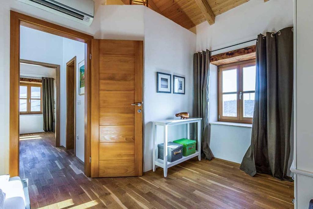 Łóżko lub łóżka w pokoju w obiekcie Villa Perla Sisan