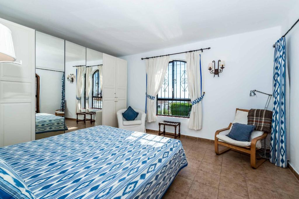 Posteľ alebo postele v izbe v ubytovaní Villa Las Lilas