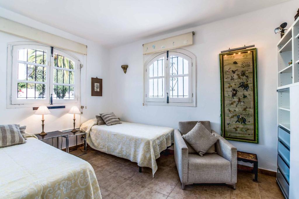 Posteľ alebo postele v izbe v ubytovaní Villa Las Lilas