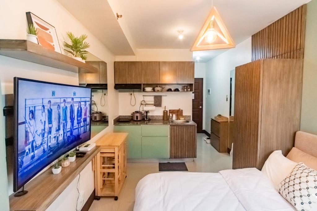 TV a/nebo společenská místnost v ubytování Grand Residences Cebu ETB - Near IT Park and Ayala Cebu