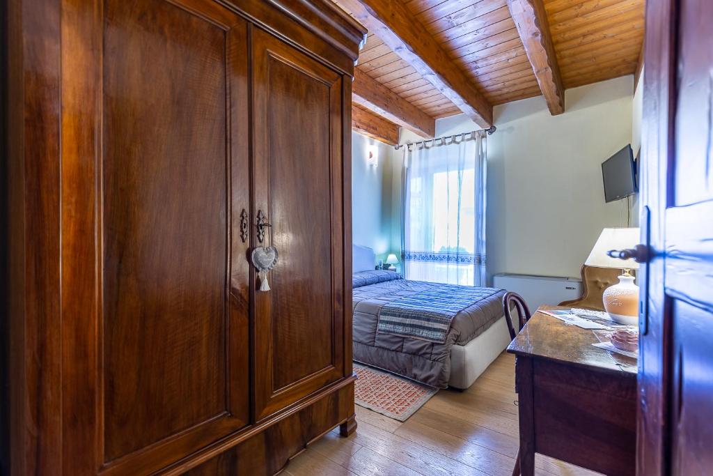 Letto o letti in una camera di Affittacamere Is Coronas