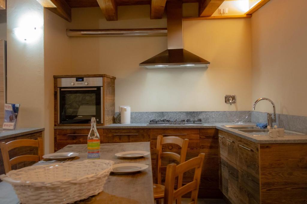 Kuchyňa alebo kuchynka v ubytovaní Inn Aosta Apartments