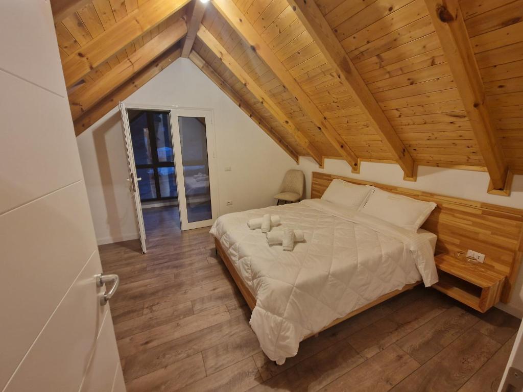 Postel nebo postele na pokoji v ubytování HANI CEPIT