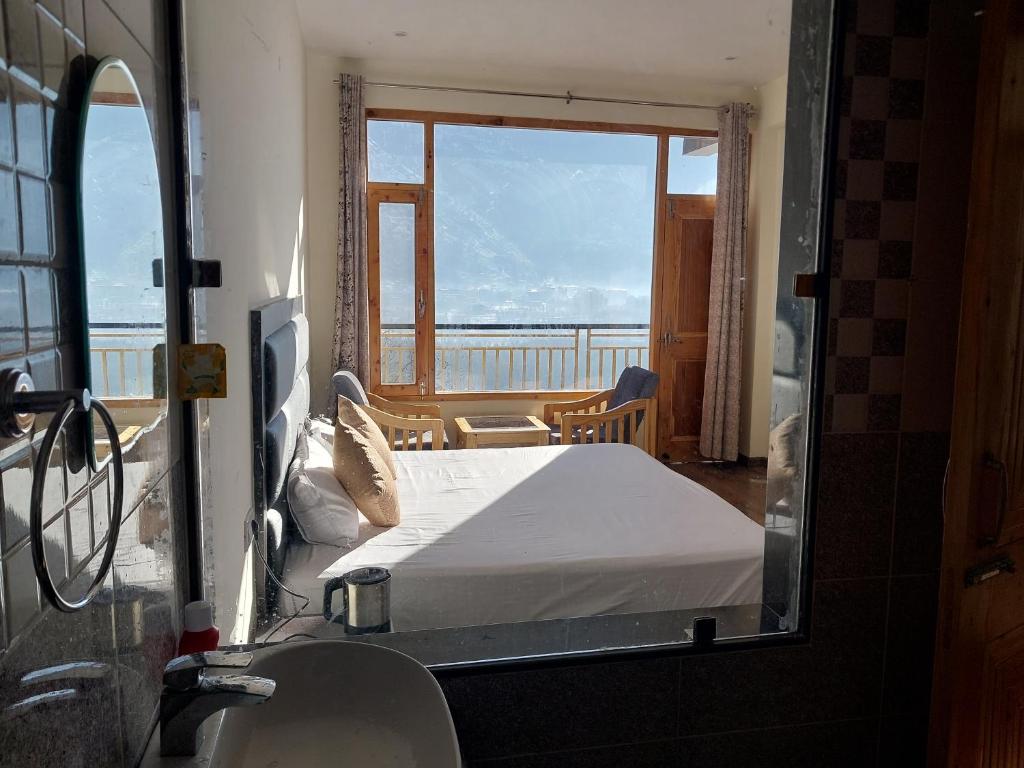 Postel nebo postele na pokoji v ubytování Nomad Bed & Breakfast