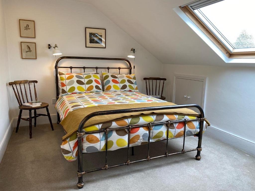 a bedroom with a bed in a attic at North View B&B in Penrith
