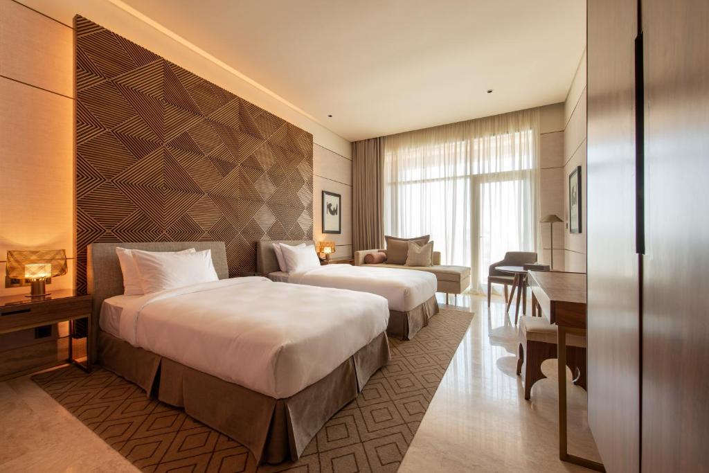 Postel nebo postele na pokoji v ubytování SHIRVAN Hotel City Yard Jeddah