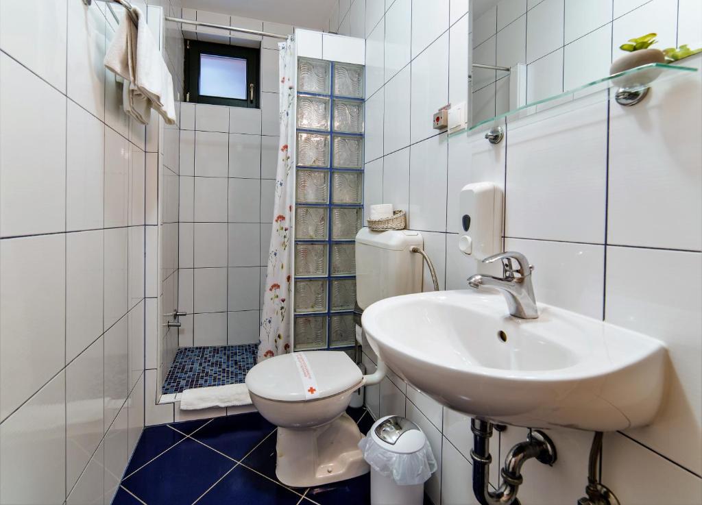 Koupelna v ubytování Hotel Kandilj