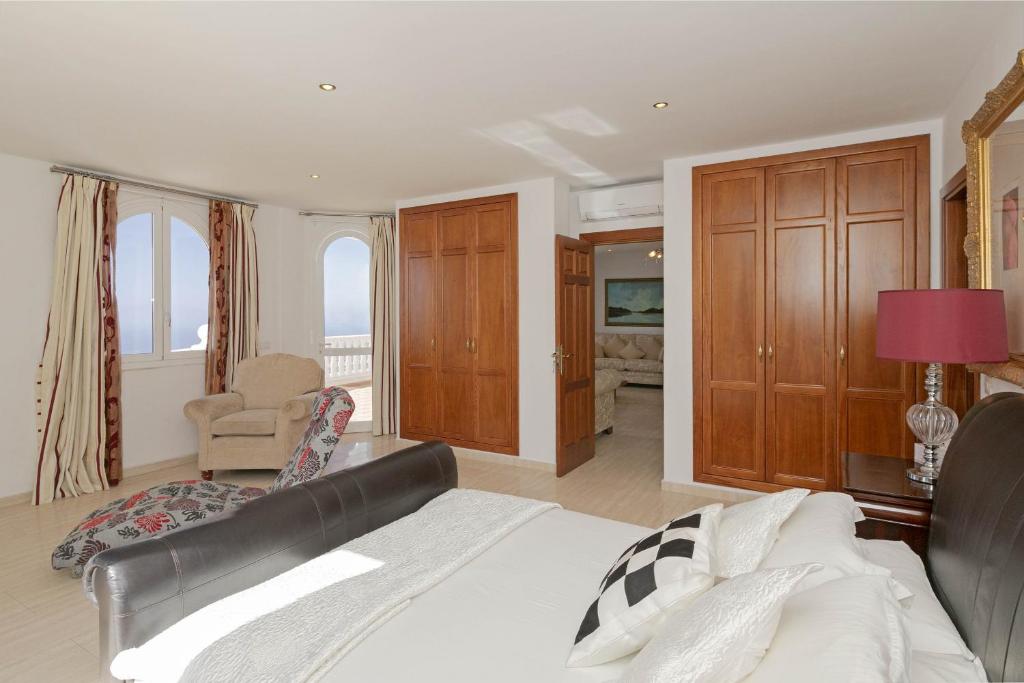 Postel nebo postele na pokoji v ubytování Villa Panoramica