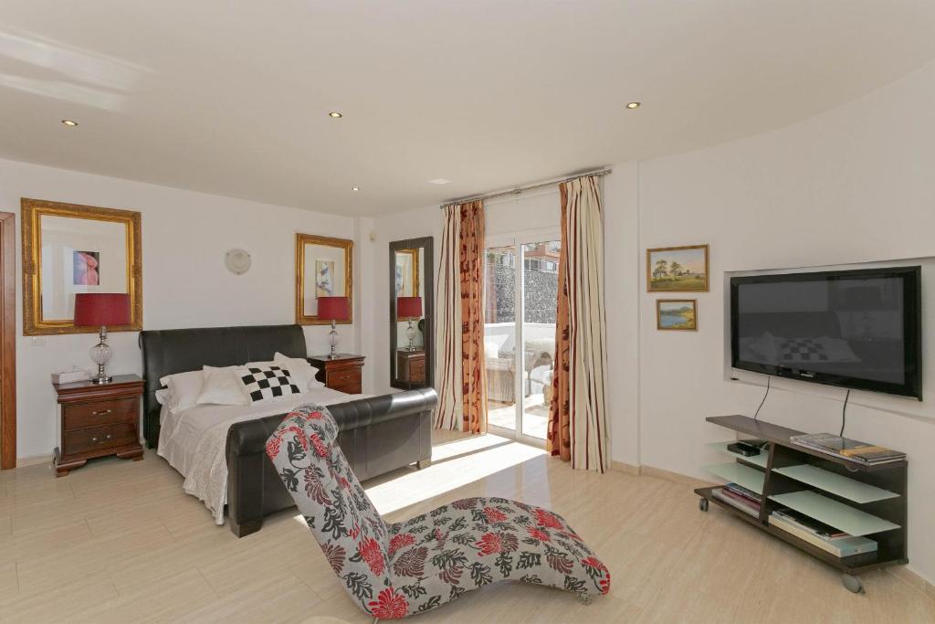 TV a/nebo společenská místnost v ubytování Villa Panoramica