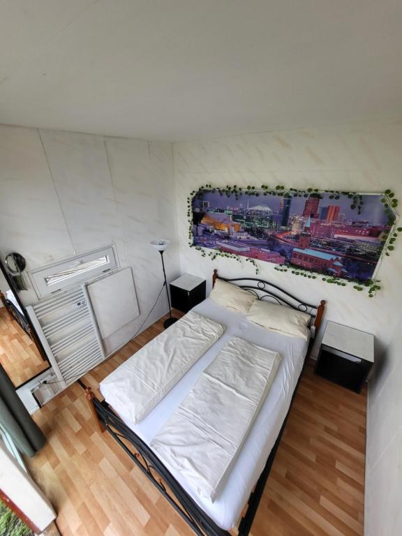 Postel nebo postele na pokoji v ubytování EASY Lodges Berlin