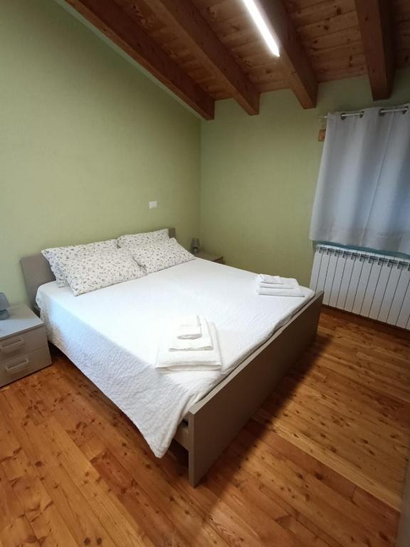 Postel nebo postele na pokoji v ubytování CONSTANCIA TRATTORIA