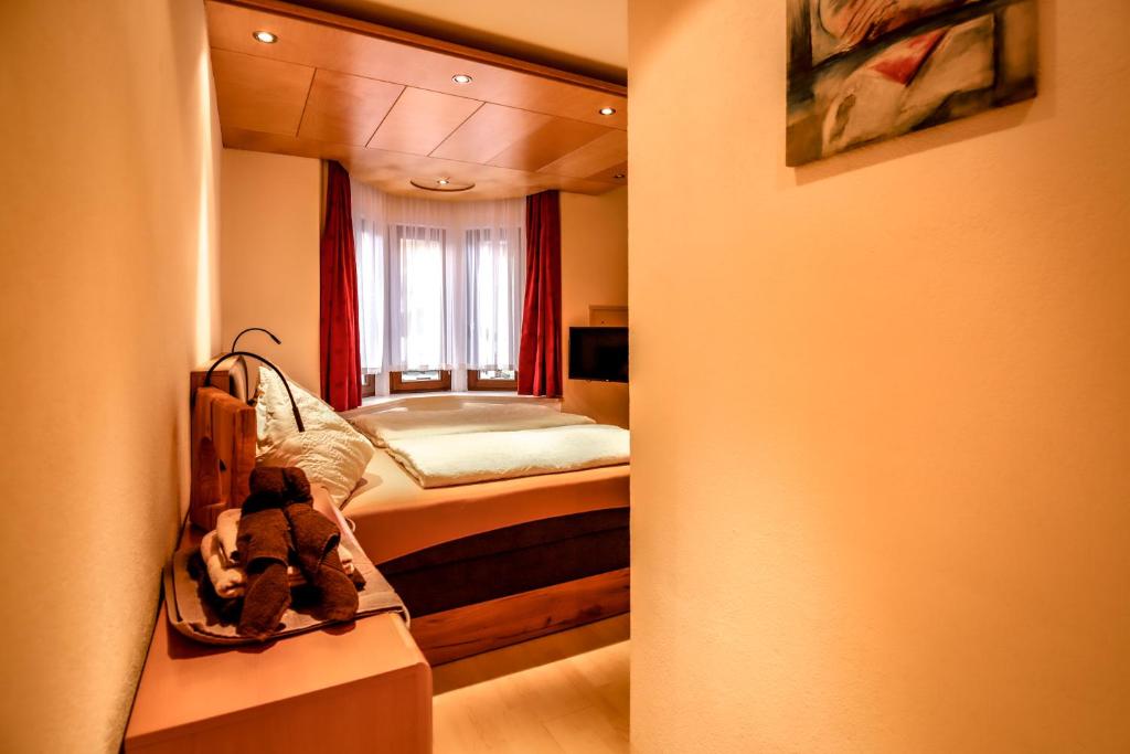 Postel nebo postele na pokoji v ubytování Gasthof Geraerhof