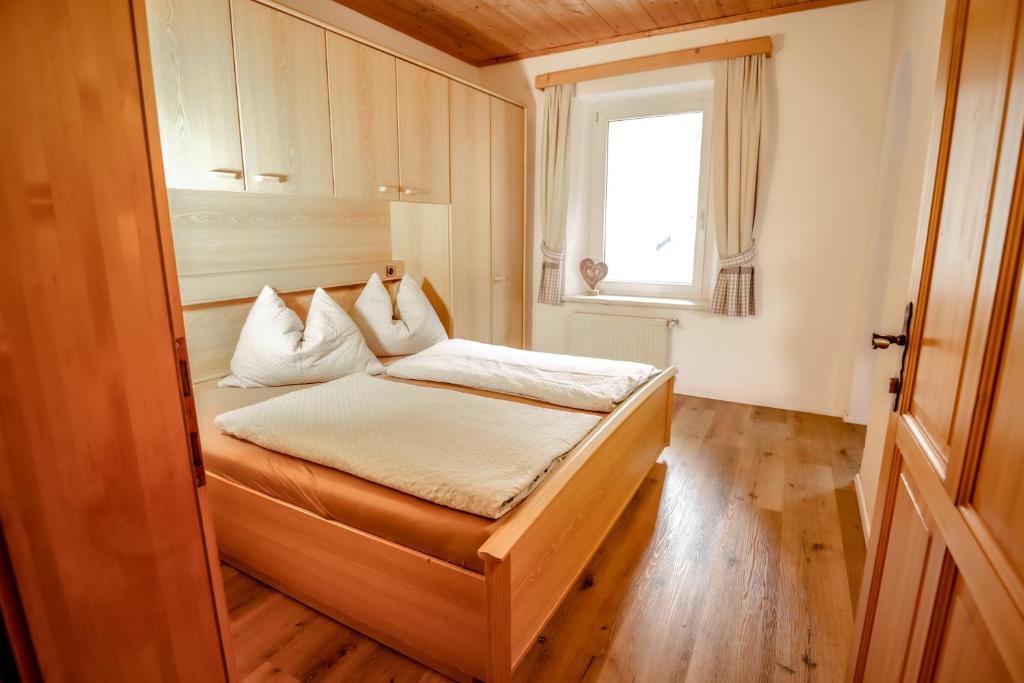 Postel nebo postele na pokoji v ubytování Gasthof Geraerhof
