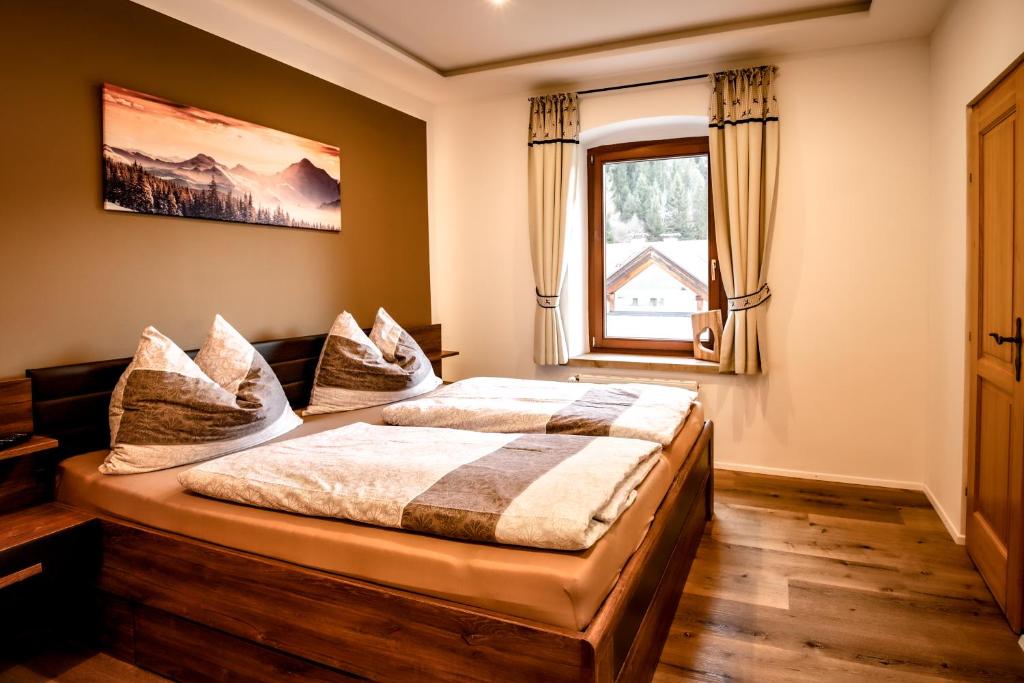 Postel nebo postele na pokoji v ubytování Gasthof Geraerhof