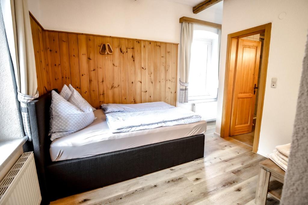 Postel nebo postele na pokoji v ubytování Gasthof Geraerhof